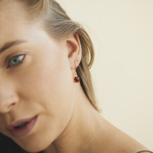 Gold-plated earrings with cognac Baltic amber