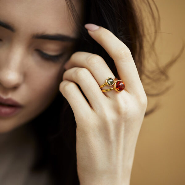 Gold plated ring with green genuine amber