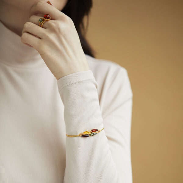 Gold plated cuff bracelet with multicolor amber