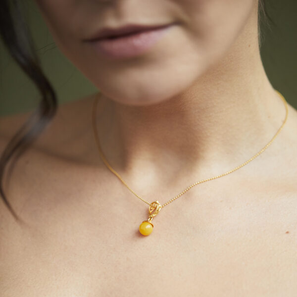 Gold plated necklace with milky amber